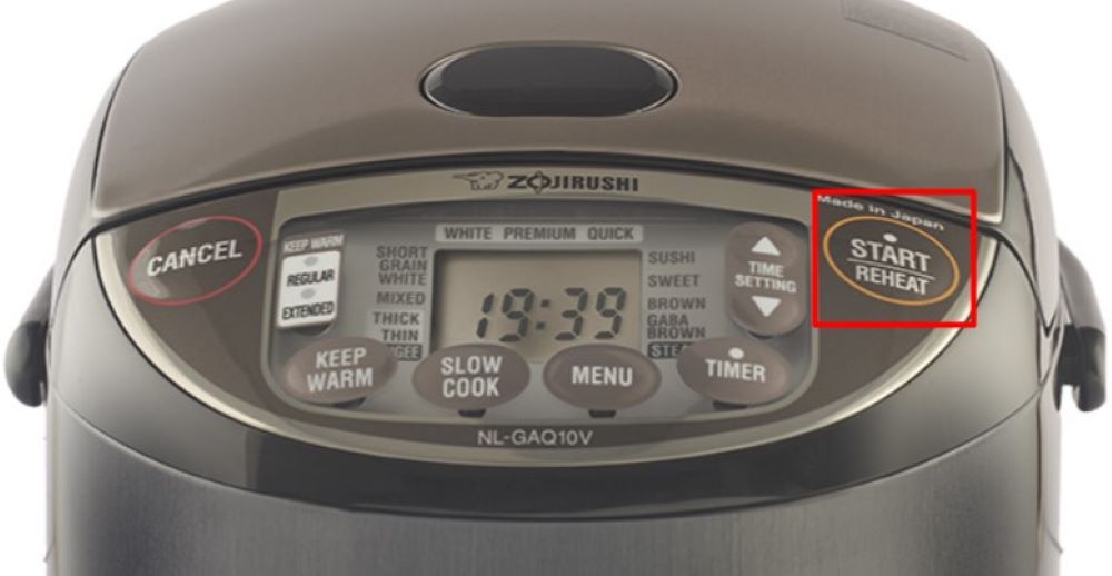 Nhấn nút Start Reheat để hâm cơm bằng nồi cơm điện Zojirushi (Nguồn: Internet) 